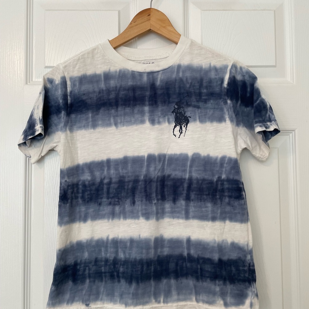 Polo shirt in ombré striped print in blue